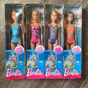 Set of 4 Barbies